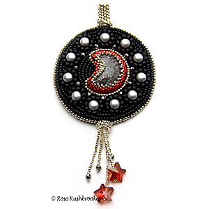 Black Moon Rising Earrings by Rose Rushbrooke. Bead embroidery and weaving. Glass seed beads, cabochons, and stone focal. Image copyright © Rose Rushbrooke.