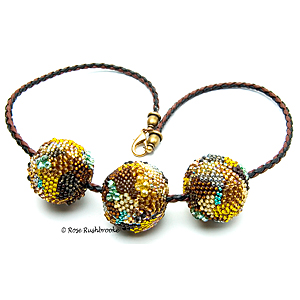 Inspired by a Bee Necklace by Rose Rushbrooke. Bead weaving. Glass seed beads, pearls, and Swarovski crystals. Image copyright © Rose Rushbrooke.