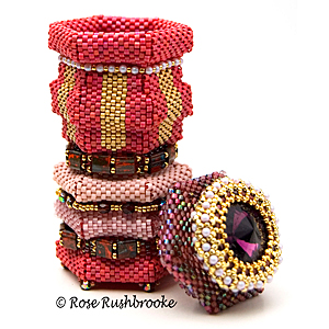 Red Ceilite Pot with Lid by Rose Rushbrooke. Bead weaving. Glass seed beads, pearls, and Swarovski crystals. Image copyright © Rose Rushbrooke.