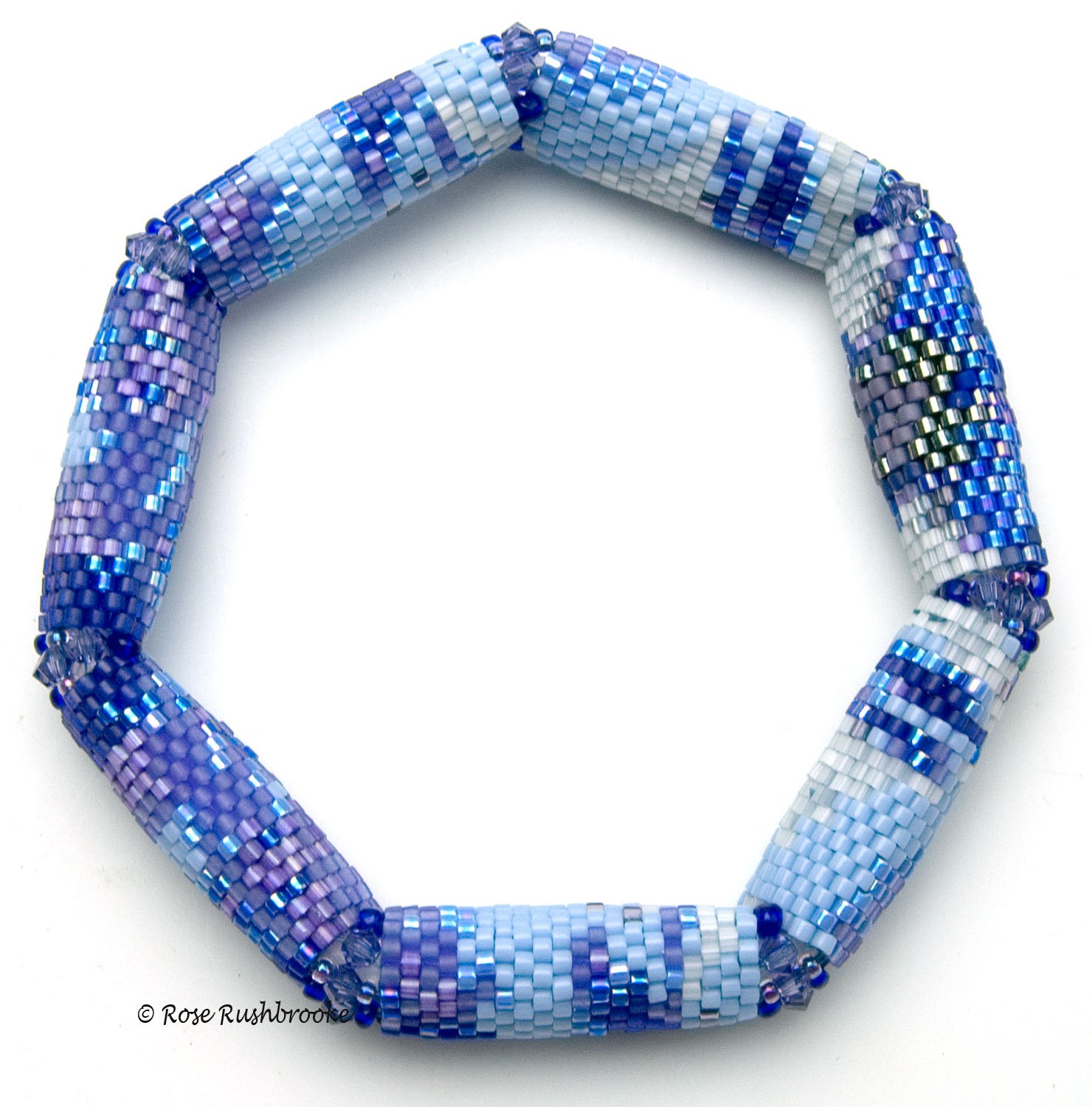 Blue Mophead Hydrangea bracelet by Rose C Rushbrooke.  Bead weaving using delicas, seed beads and fire polish crystals, peyote stitch. Image copyright &copy; Rose C Rushbrooke.