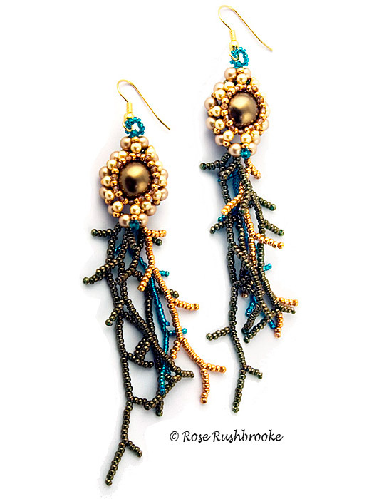 Chrysogonum, gold and green earrings - cubic right angle weave bead stitch. Made with seed beads, crystals, and glass pearls. Image copyright © Rose Rushbrooke.