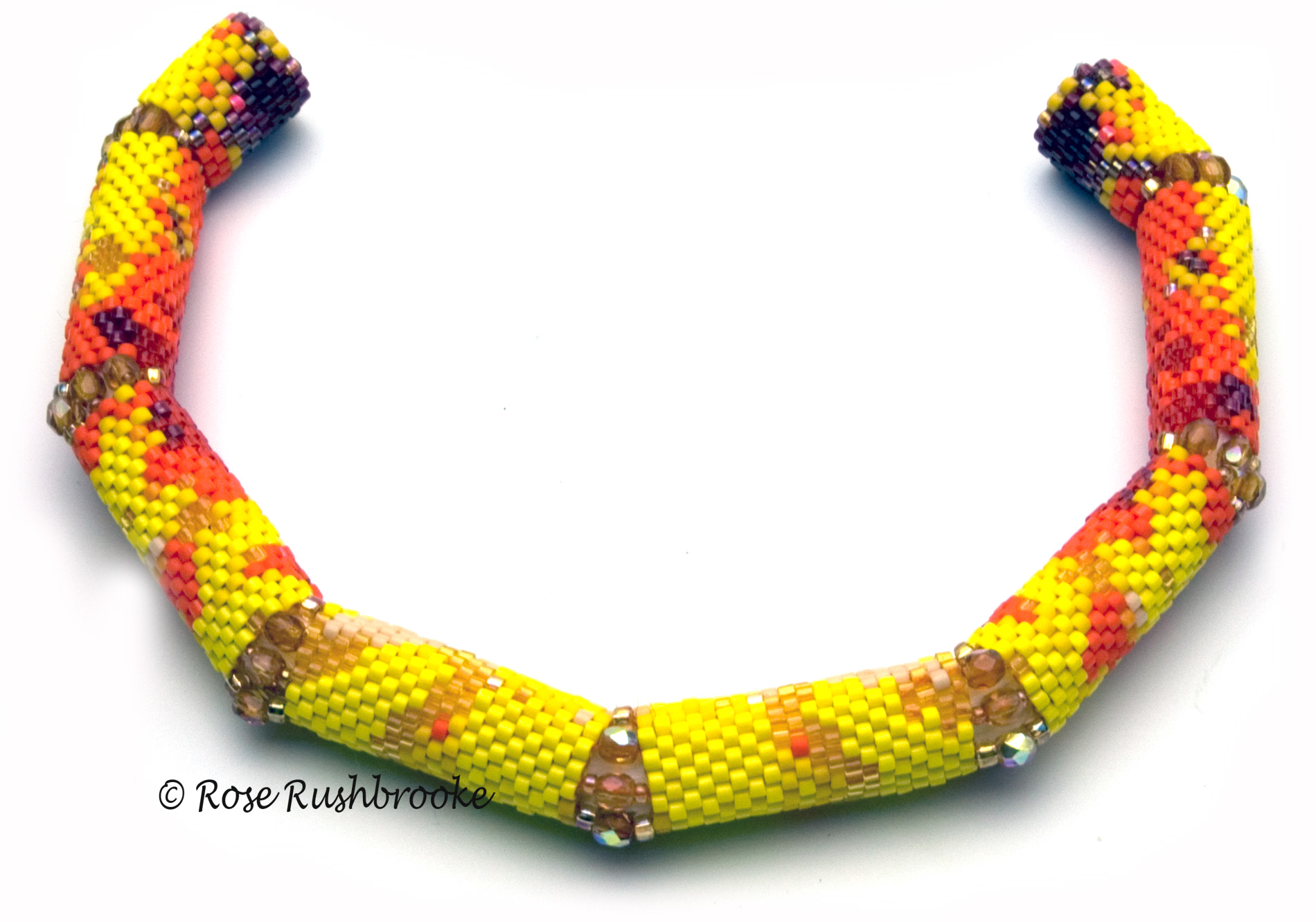  Open Monsella Tulip Bracelet by Rose Rushbrooke. Bead weaving using delicas, seed beads and fire polish crystals, peyote stitch. Image copyright © Rose Rushbrooke.