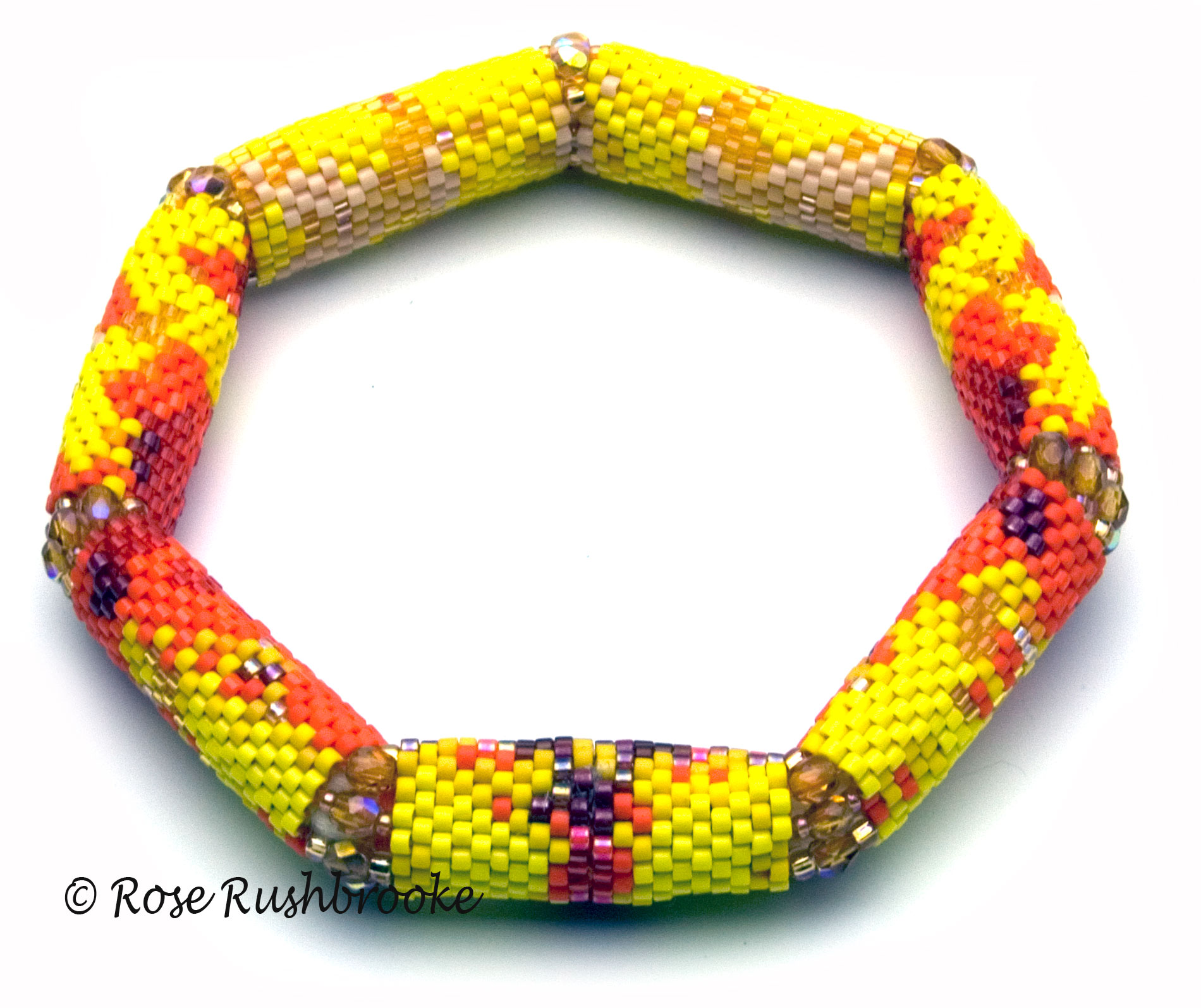 Monsella Tulip Bracelet by Rose Rushbrooke. Bead weaving using delicas, seed beads and fire polish crystals, peyote stitch. Image copyright © Rose Rushbrooke.