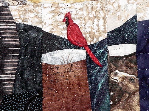 Detail of cardinal from Dock Over Mocassin Lake  - quilt by Rose Rushbrooke. Image copyright &copy; Rose Rushbrooke.
