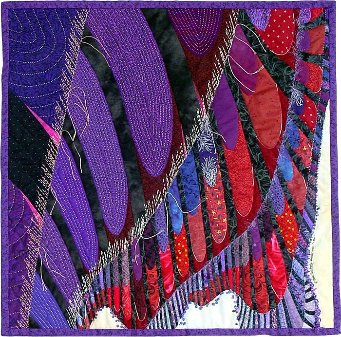 Lydia - fractal art quilt by Rose Rushbrooke. Hand stitched using hand dyed and commercially printed fabrics. Image copyright © Rose Rushbrooke.